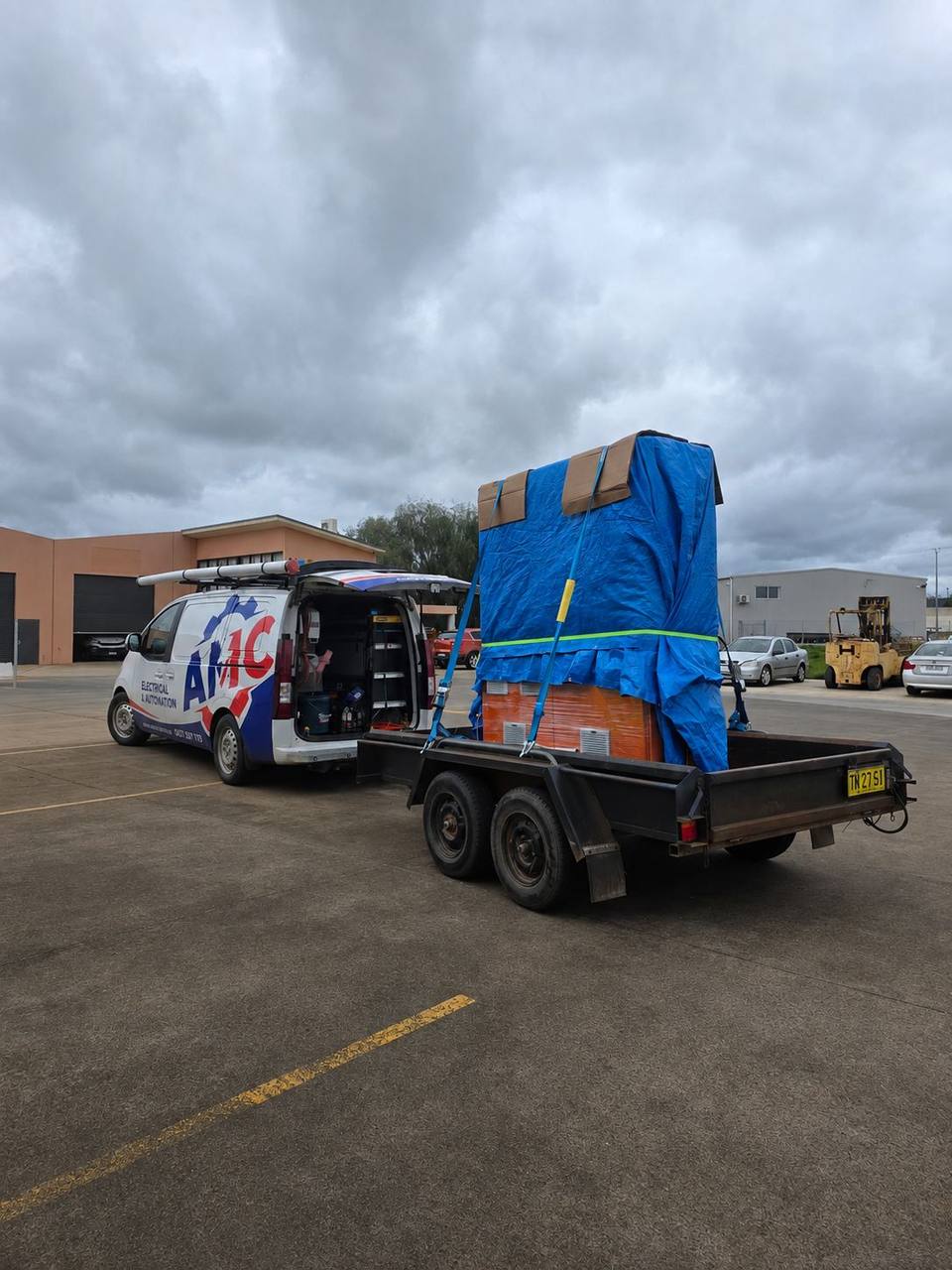 The board strapped on the trailer for delivery