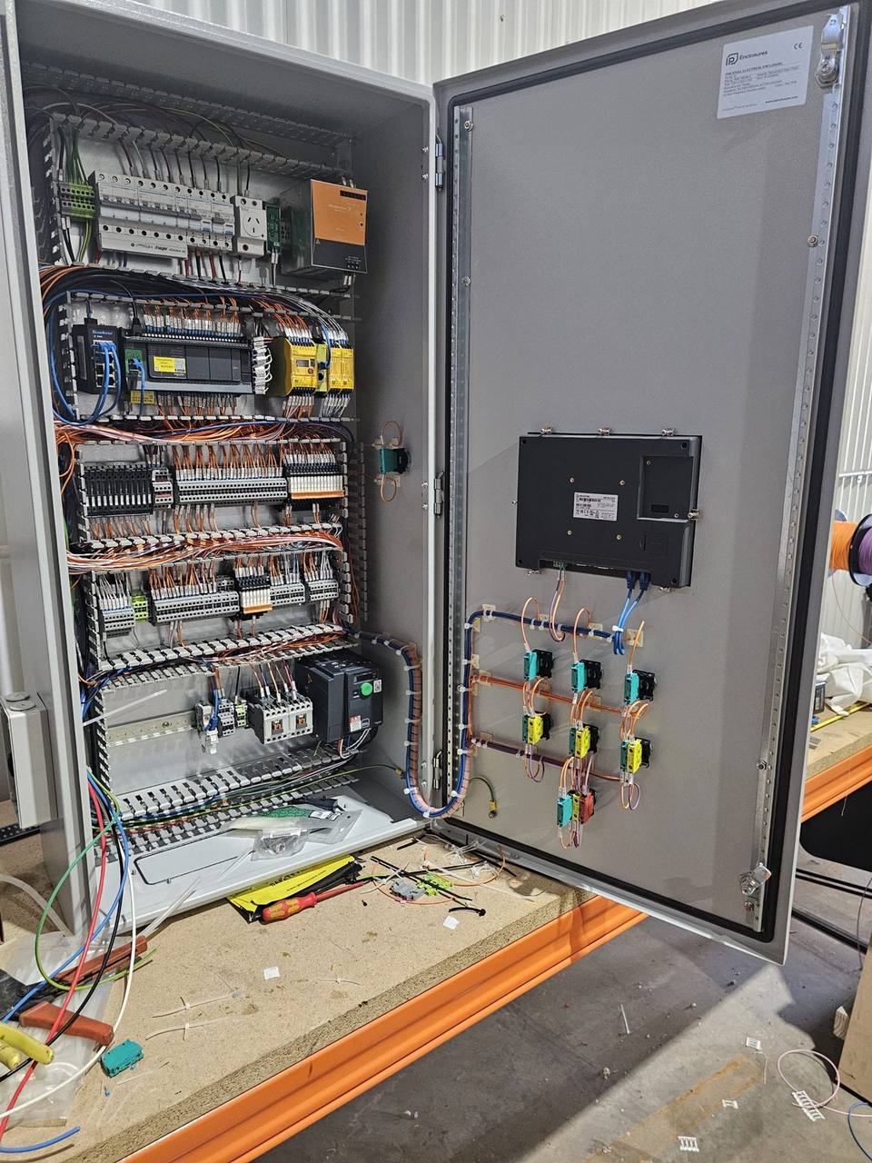 Control panel with HMI touchscreen on the door