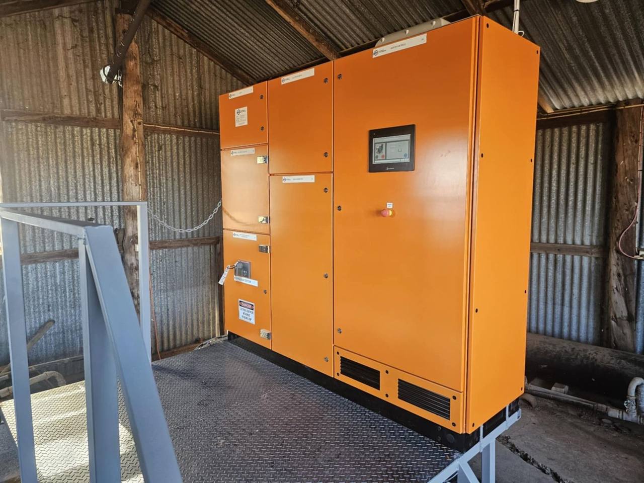 Automated river pump control board installed in a pump shed